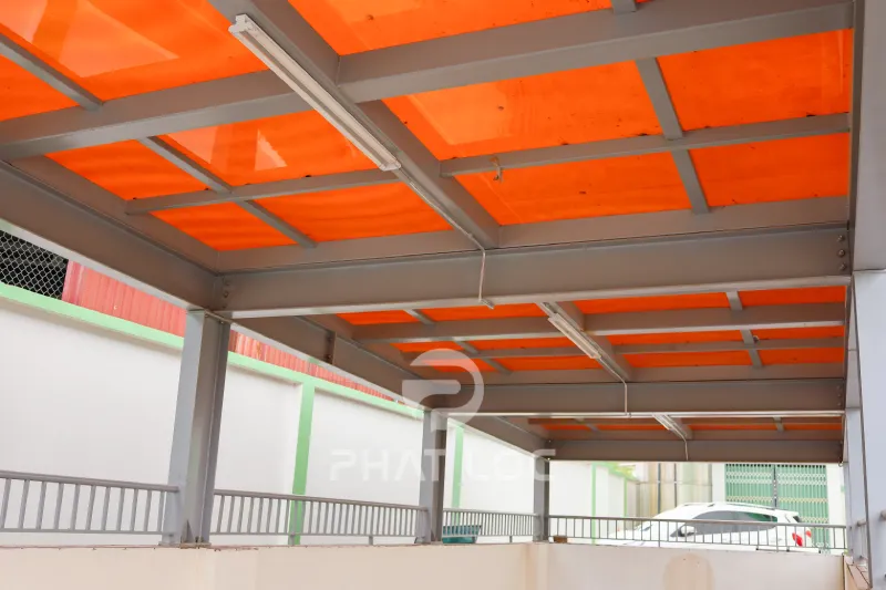 Dự Án Lắp Đặt 400m² Mái Che Polycarbonate Đặc Ruột 10mm Màu Nâu Trà Cho Sảnh Chờ Và Hầm Để Xe Tại Bệnh Viện Tại Bắc Giang, Việt Nam 5 Quy mô và hiệu quả thực tế của "Dự Án Lắp Đặt 400m² Mái Che Polycarbonate Đặc Ruột 10mm Màu Nâu Trà Cho Sảnh Chờ Và Hầm Che Tại Bệnh Viện Tại Bắc Giang, Việt Nam"